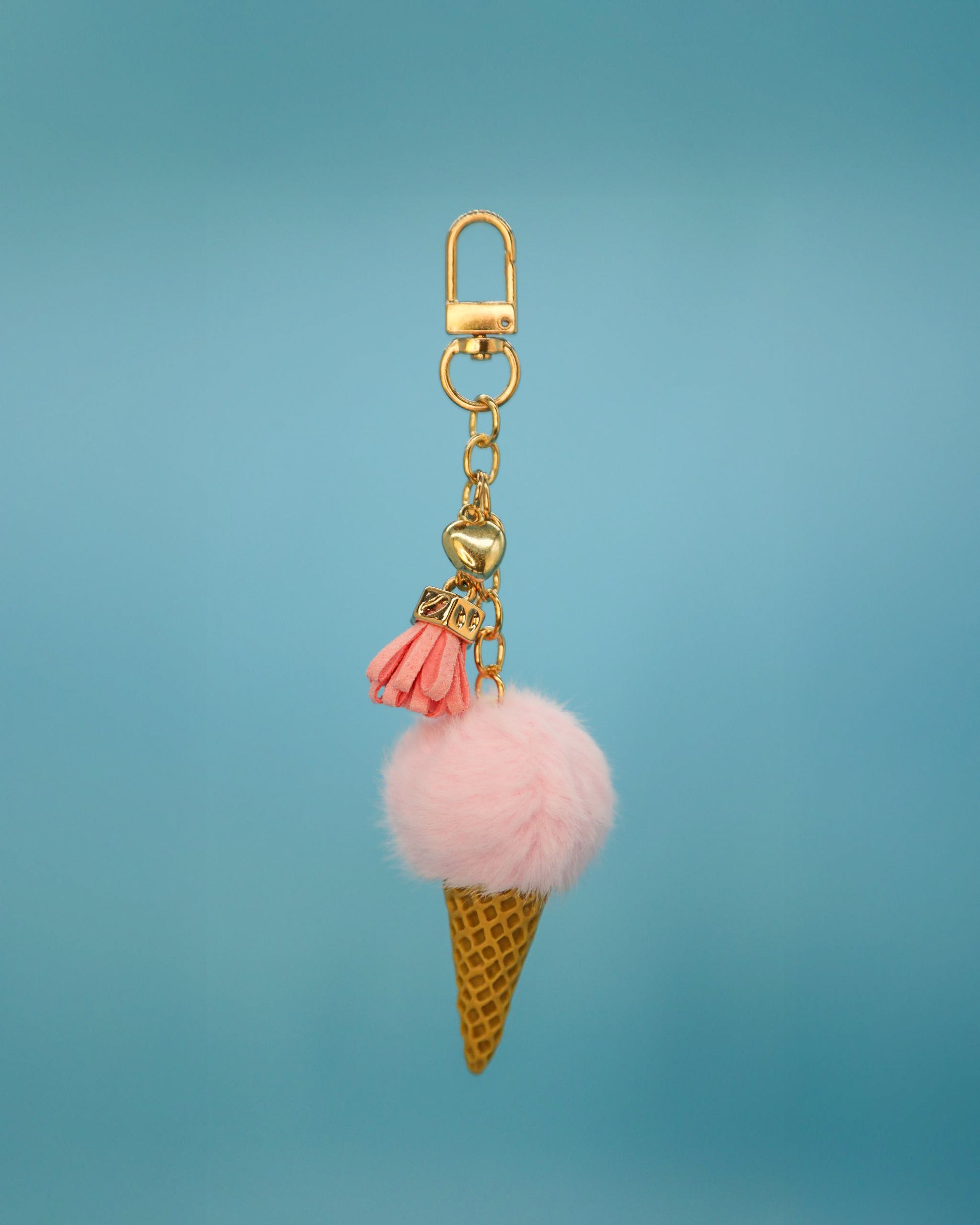 Loomi ice-cream water bottle charm with pink scoop and cone pendant.