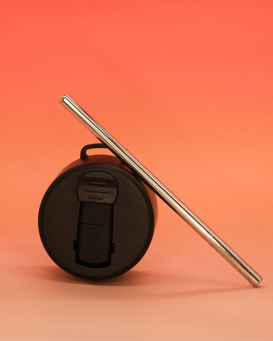 “Black flip-straw lid with reusable stainless-steel straw for Loomi bottle